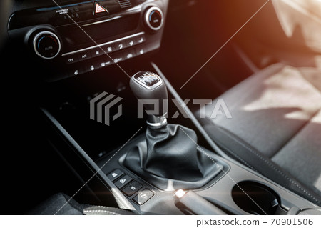 MURES, ROMANIA - OCTOBER 21, 2020, interior view. Manual transmission gear of new car. MURES, ROMANIA - OCTOBER 21, 2020, interior view. Manual transmission gear of new car. 70901506