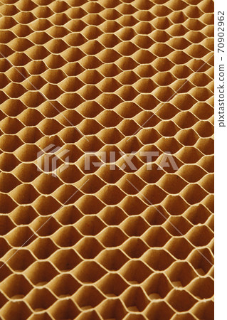 honeycomb cells of cardboard stiffening rib background 70902962