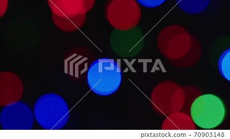 New year or Christmas shimmering festive garland blurred backdrop Deep bokeh 70903148