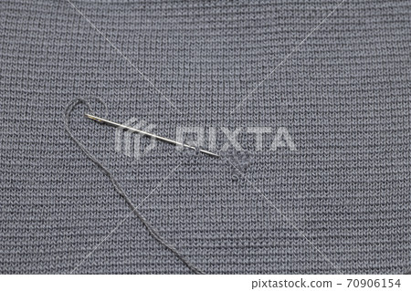 Sew and repair holes in clothes Sew and repair holes in clothes 70906154