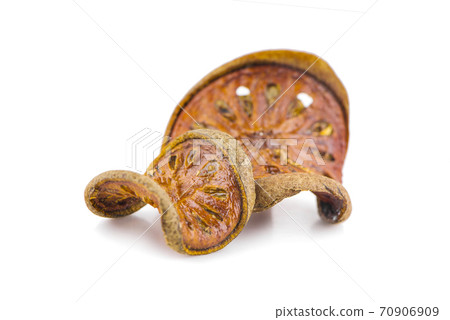 dried quince slices an isolated on white background 70906909