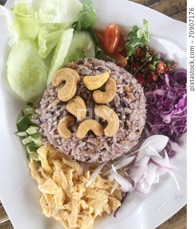Fried rice with salted fish and chinese kale with vegetables Fried rice with salted fish and chinese kale with vegetables 70907176