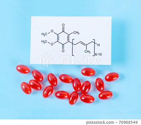 Vitamin Coenzyme Q10 with chemical formula on a blue background. Vitamin Coenzyme Q10 with chemical formula on a blue background. 70908549