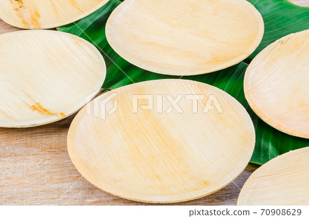 Kitchenware made from dried betel nut leaf palm, natural material. Kitchenware made from dried betel nut leaf palm, natural material. 70908629