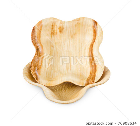 Cup made from dried betel nut leaf palm, isolated. The Green product eco friendly concept. Cup made from dried betel nut leaf palm, isolated. The Green product eco friendly concept. 70908634
