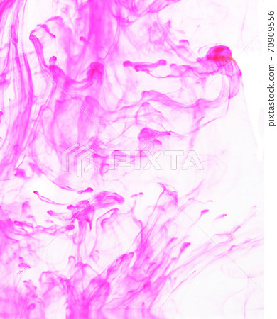Pink colored ink spreading in the water , Colorful blur smoke on white background Pink colored ink spreading in the water , Colorful blur smoke on white background 70909556