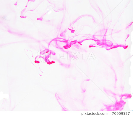 Pink colored ink spreading in the water , Colorful blur smoke on white background Pink colored ink spreading in the water , Colorful blur smoke on white background 70909557