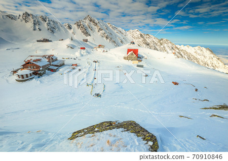 Stunning winter landscape with frozen Balea lake, Transylvania, Romania, Europe 70910846