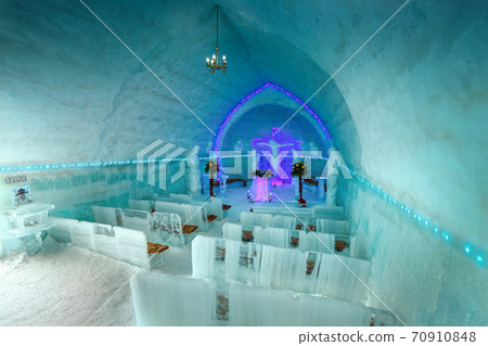 Stunning ice church interior view in Fagaras mountains, Transylvania, Romania 70910848