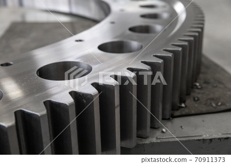 new big gear at the Metalworking plant. Natural daylight new big gear at the Metalworking plant. Natural daylight 70911373