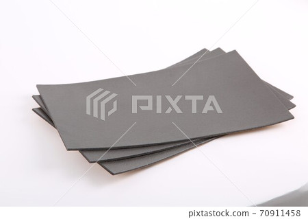 foamed sheet sound insulation for the car. Three sheets close-up 70911458