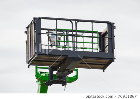 Hydraulic platform or elevator using for transport different things. Modern industrial technology Hydraulic platform or elevator using for transport different things. Modern industrial technology 70911867