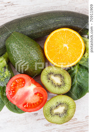 Fruits and vegetables containing vitamin K, potassium, natural minerals and dietary fiber Fruits and vegetables containing vitamin K, potassium, natural minerals and dietary fiber 70911909