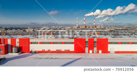 Beautiful modern industrial enterprise. The aerial photograph of a winter Sunny day Beautiful modern industrial enterprise. The aerial photograph of a winter Sunny day 70912056