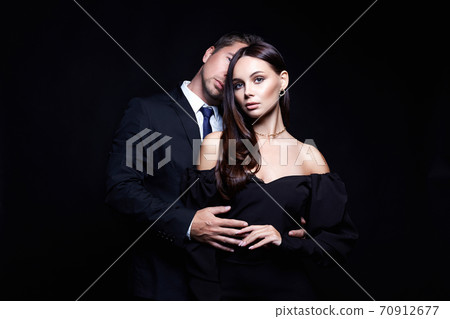 beautiful Couple over black background beautiful Couple over black background 70912677