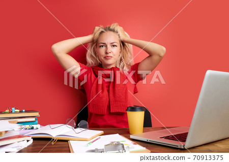young caucasian disillusioned woman needs some rest at work young caucasian disillusioned woman needs some rest at work 70913375