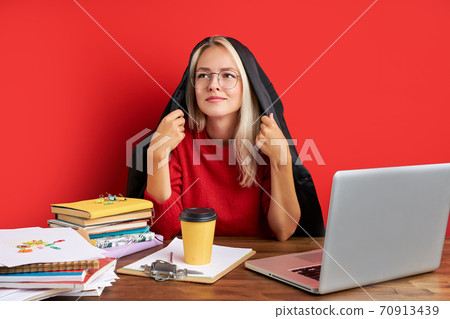 young secretary is bored at work place 70913439