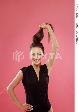 Portrait of woman with beautiful long hair. Beauty model girl with brown straight long hair . Care and hair products Portrait of woman with beautiful long hair. Beauty model girl with brown straight long hair . Care and hair products 70913875