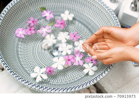 spa treatments for female hands, close-up 70913973