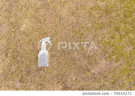 Spraying herbicides Spraying herbicides 70914271