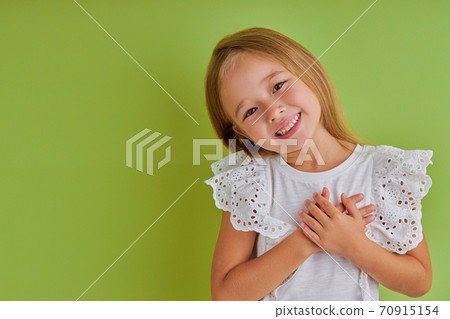 kind little girl say thanks at camera kind little girl say thanks at camera 70915154