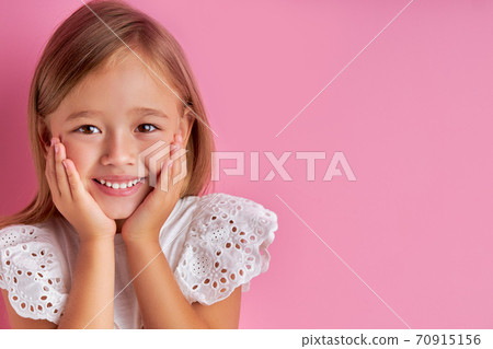 adorable funny little girl waiting for surprise, dreaming adorable funny little girl waiting for surprise, dreaming 70915156
