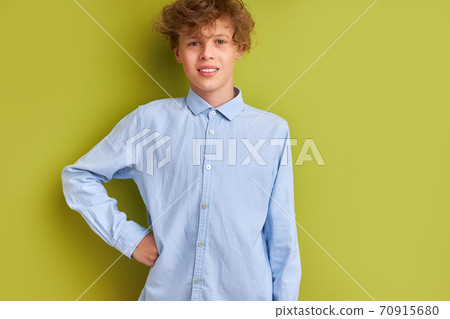 portrait of smiling young boy 14 years old isolated over white background 70915680