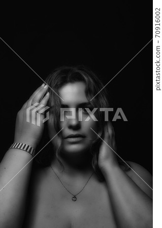 Portrait of a Plus size sexy model in black and white 70916002