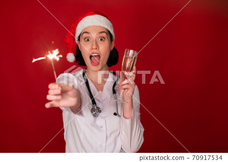 female doctor Merry Christmas and Happy New Year for healthcare professionals female doctor Merry Christmas and Happy New Year for healthcare professionals 70917534