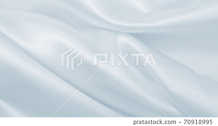 Smooth elegant grey silk or satin luxury cloth as wedding background. Luxurious Christmas background or New Year background design Smooth elegant grey silk or satin luxury cloth as wedding background. Luxurious Christmas background or New Year background design 70918995
