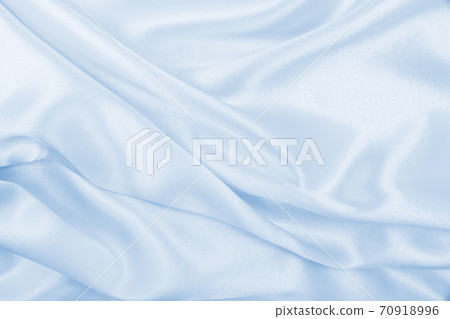 Smooth elegant blue silk or satin luxury cloth texture as abstract background. Luxurious background design Smooth elegant blue silk or satin luxury cloth texture as abstract background. Luxurious background design 70918996