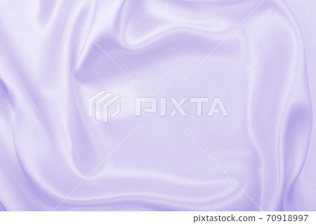 Smooth elegant lilac silk or satin texture as wedding background. Luxurious background design Smooth elegant lilac silk or satin texture as wedding background. Luxurious background design 70918997
