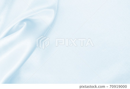 Smooth elegant blue silk or satin luxury cloth texture as abstract background. Luxurious background design Smooth elegant blue silk or satin luxury cloth texture as abstract background. Luxurious background design 70919000