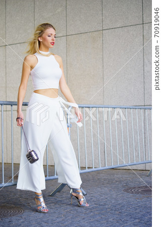 Woman wearing crop top and culottes 70919046