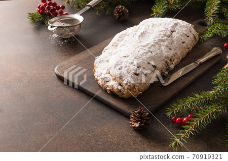 Christmas stollen - German bread on brown.  70919321