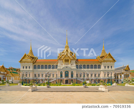 Golden pagoda at Temple of the Emerald Buddha in Bangkok, Thailand. Wat Phra Kaew and Grand palace in old town, urban city. Buddhist temple, Thai architecture. A tourist attraction 70919336