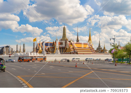 Golden pagoda at Temple of the Emerald Buddha in Bangkok, Thailand. Wat Phra Kaew and Grand palace in old town, urban city. Buddhist temple, Thai architecture. A tourist attraction 70919373