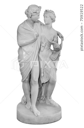 Ancient sculpture of Bacchus and Ariadne. Marble man and woman statue isolated on white background. Ancient sculpture of Bacchus and Ariadne. Marble man and woman statue isolated on white background. 70919522