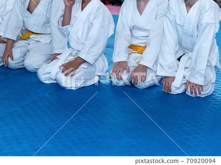 Children in kimono are sitting on tatami Children in kimono are sitting on tatami 70920094