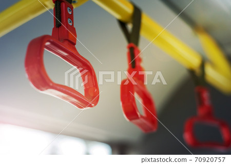 Handles on public transport Handles on public transport 70920757
