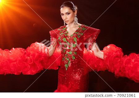 Woman in Cabaret Carnival Fancy Dress Gown with glitter, luxury decoration Woman in Cabaret Carnival Fancy Dress Gown with glitter, luxury decoration 70921061
