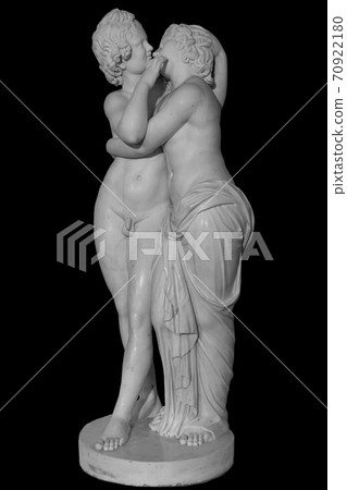Ancient Amour and Psyche lovers statue. Kissing marble man and woman statue isolated on black background. Ancient Amour and Psyche lovers statue. Kissing marble man and woman statue isolated on black background. 70922180