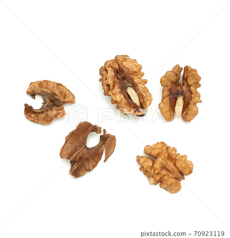 shelled walnuts and partition isolated on white background, top view shelled walnuts and partition isolated on white background, top view 70923119