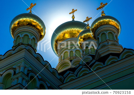 gold domes with crosses on the roof of the Orthodox church, nobody. 70923158