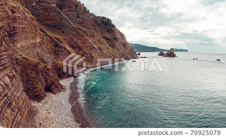 Sharp cliff on the coast of Vizcaya in Spain Sharp cliff on the coast of Vizcaya in Spain 70925079