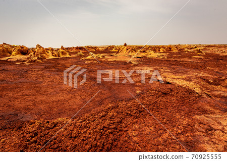 Mysterious scenery and sky near Dallol volcano, stopped by on a tour of the Danakil Desert in Ethiopia Mysterious scenery and sky near Dallol volcano, stopped by on a tour of the Danakil Desert in Ethiopia 70925555