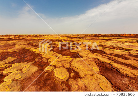 Mysterious scenery and sky near Dallol volcano, stopped by on a tour of the Danakil Desert in Ethiopia Mysterious scenery and sky near Dallol volcano, stopped by on a tour of the Danakil Desert in Ethiopia 70925600