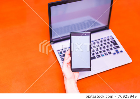 Smartphones and PCs [Image of digitization] 70925949