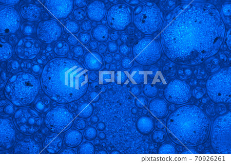 Beautiful abstract blue bubbles in water extreme. Abstract nature pattrn for design. Macro photogrpaphy view. 70926261