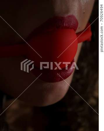 Sexual woman with ball gag in mouth Sexual woman with ball gag in mouth 70926494